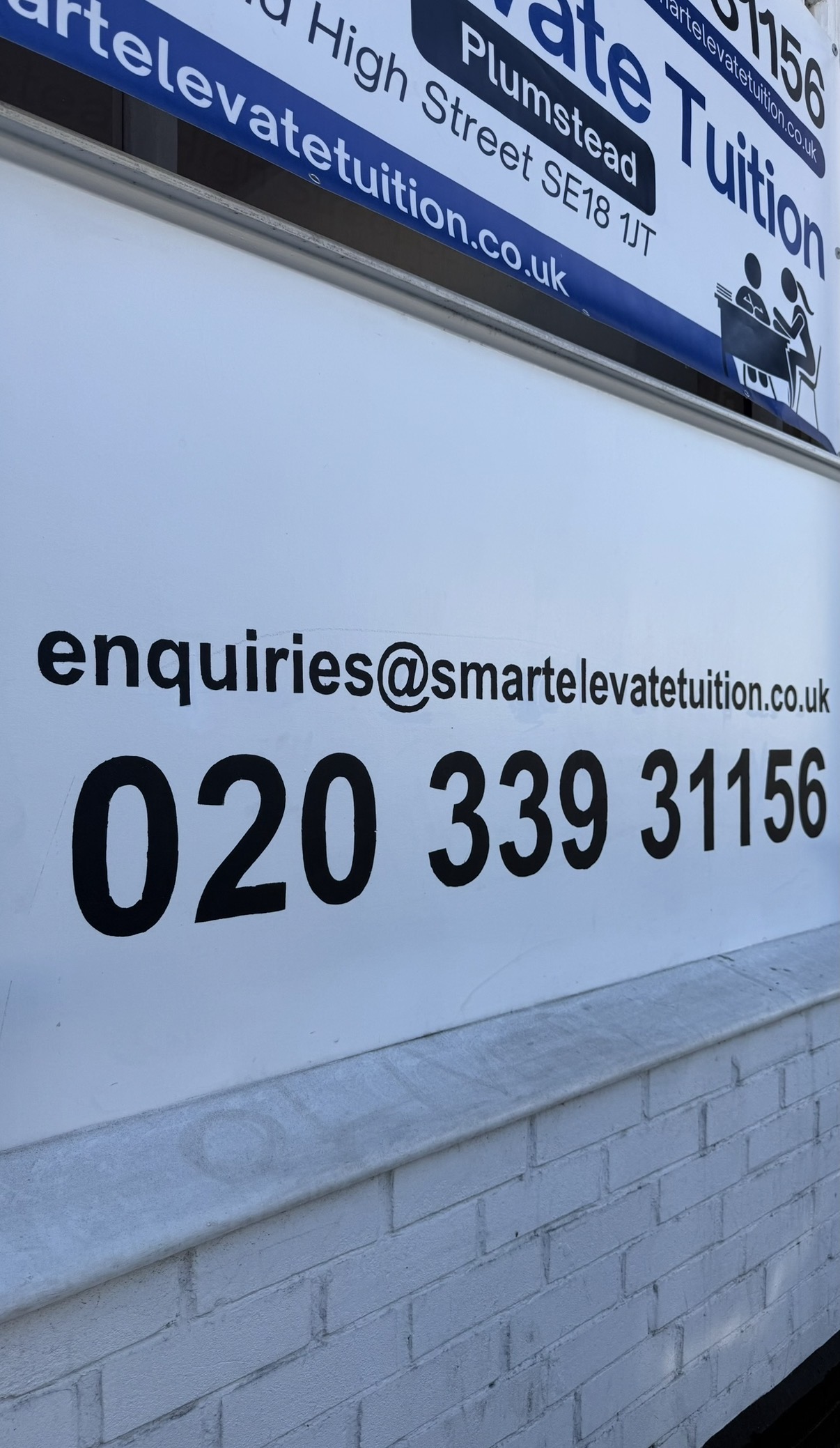 Hand-painted SmartElevate Tuition exterior signage by Shehara